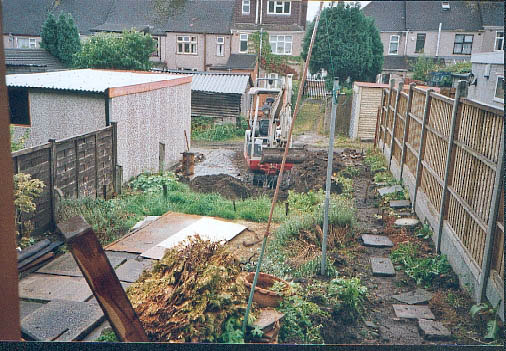 Digging Out with a hired digger.
